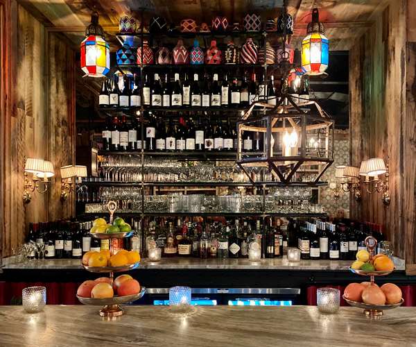 Wine storage behind bar